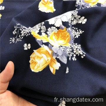 Fond bleu marine avec fleur colorée rayonne imprimée 45S